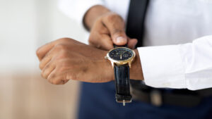 African American businessman wearing expensive wrist watch